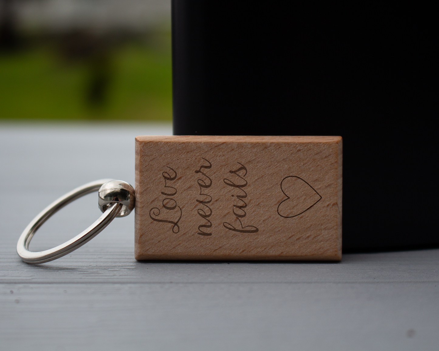 Love Never Fails Wooden Keychain - Heart Engraved Gift for Home, Car, or Office