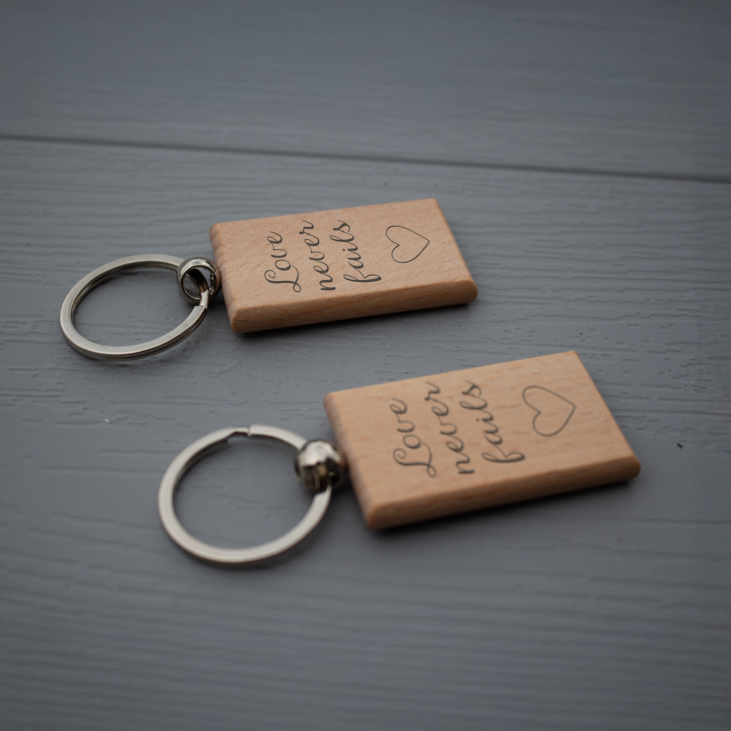 Love Never Fails Wooden Keychain - Heart Engraved Gift for Home, Car, or Office